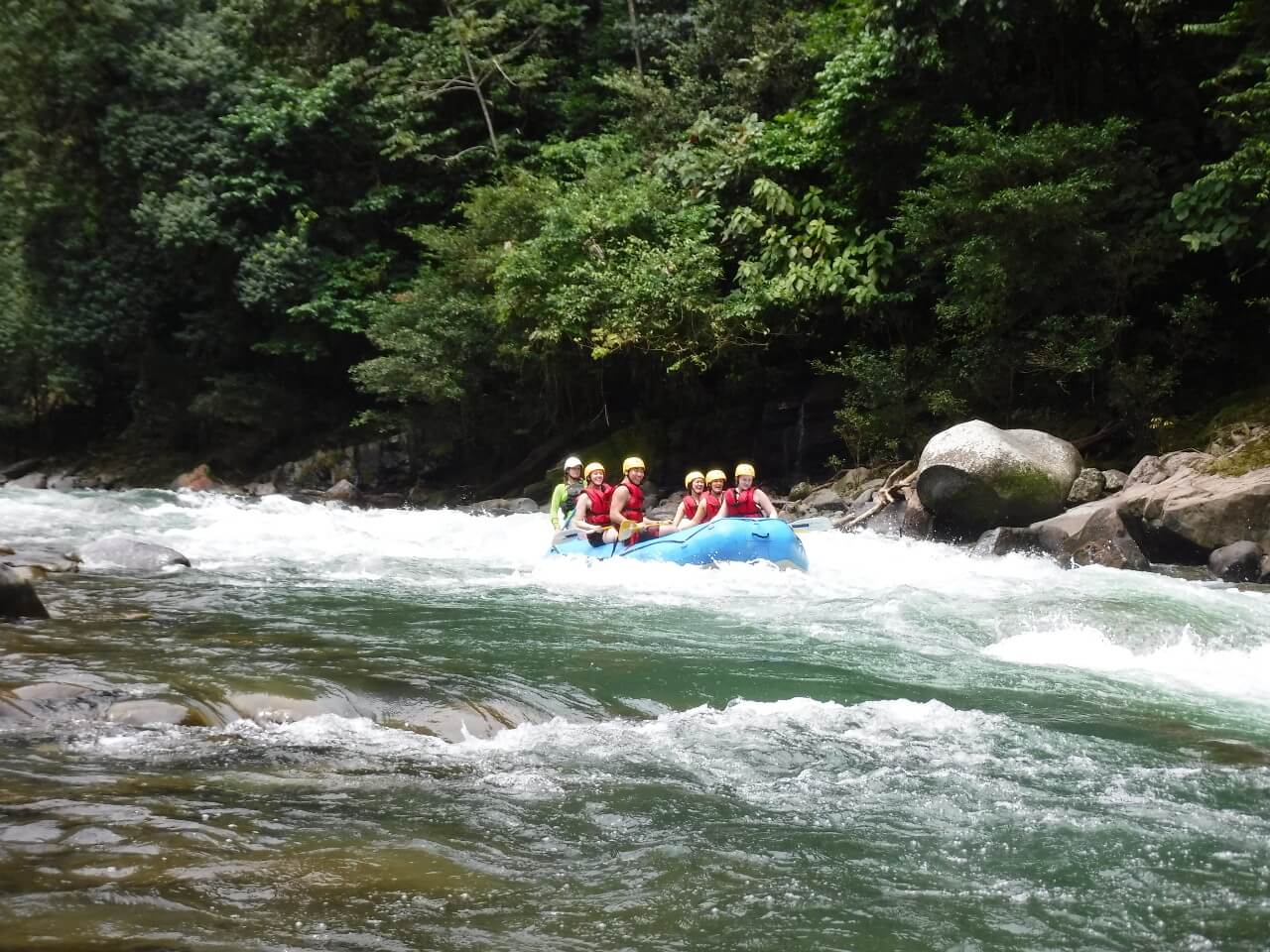Whitewater rafting adventure through rainforest canyon on the Pacuare River Costa Rica